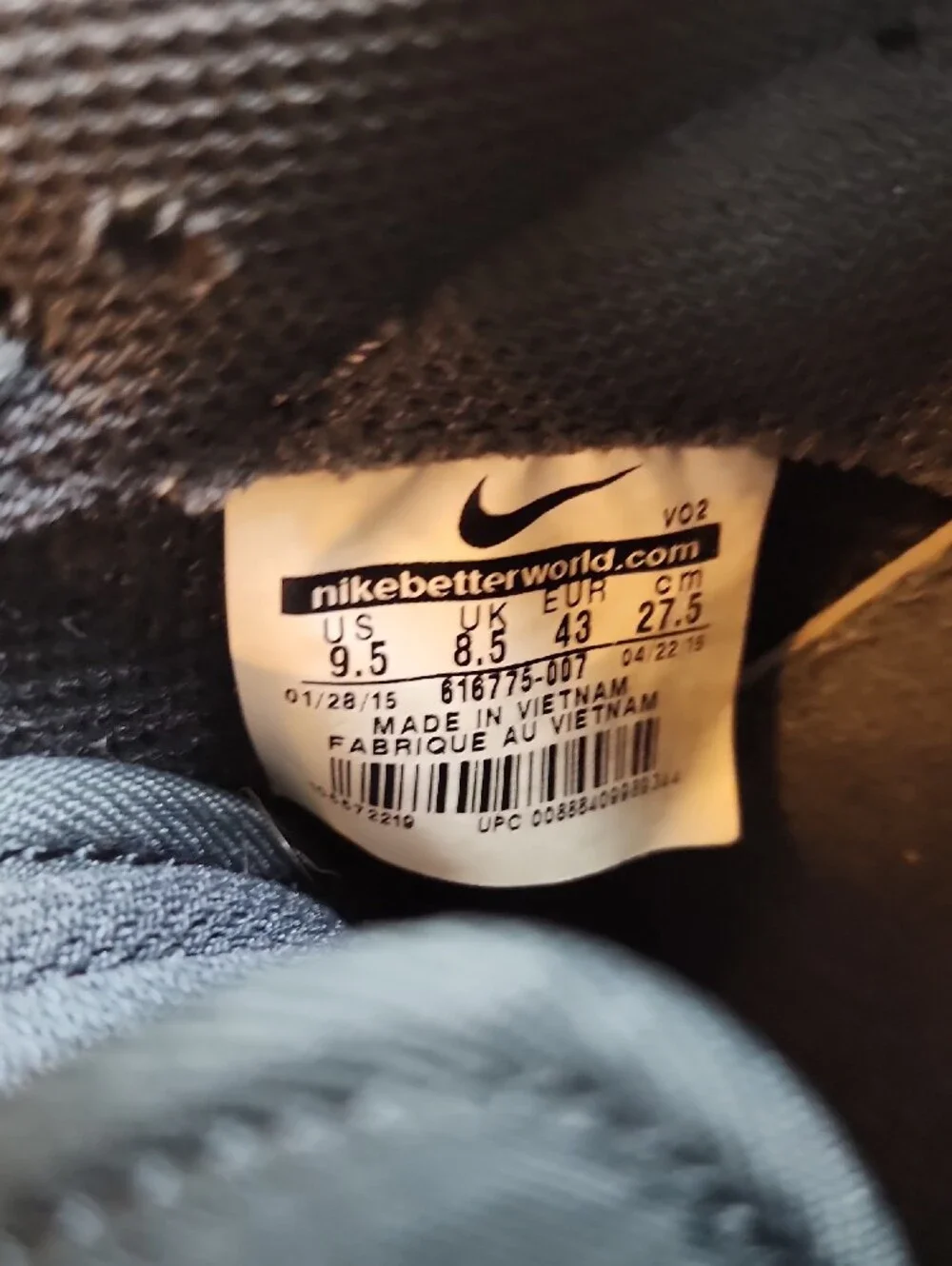 Nike Black Sneakers with Metallic Silver Swoosh and White Sole